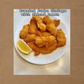 Breaded Jumbo Shrimps with Sliced Lemon