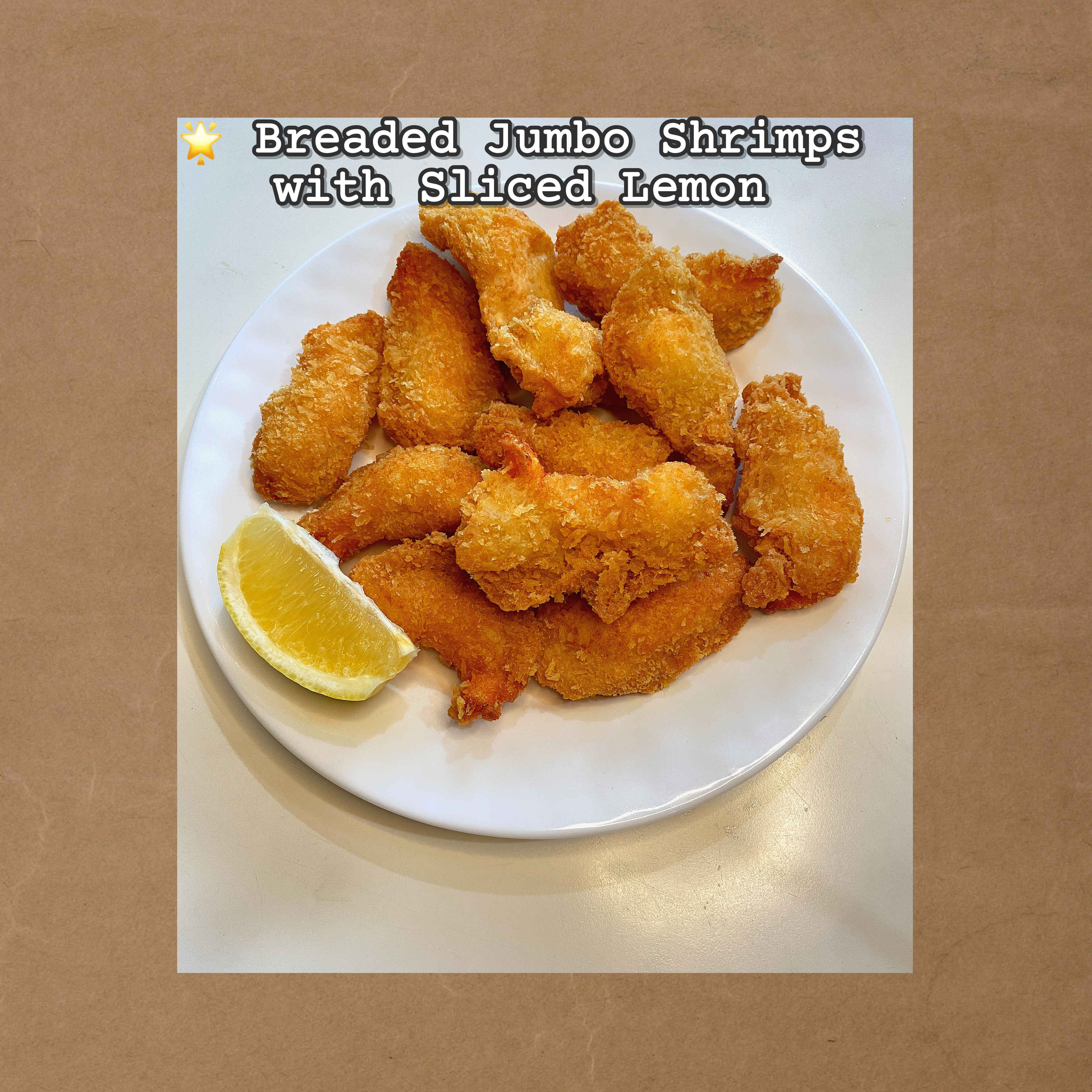 Breaded Jumbo Shrimps with Sliced Lemon